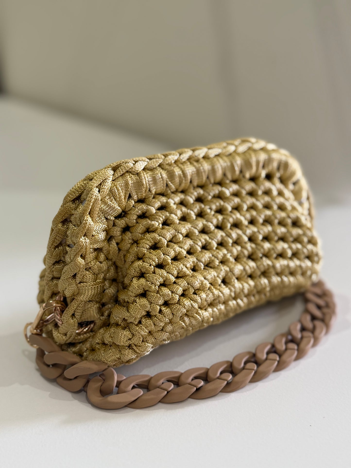 Crochet bag with gold threads